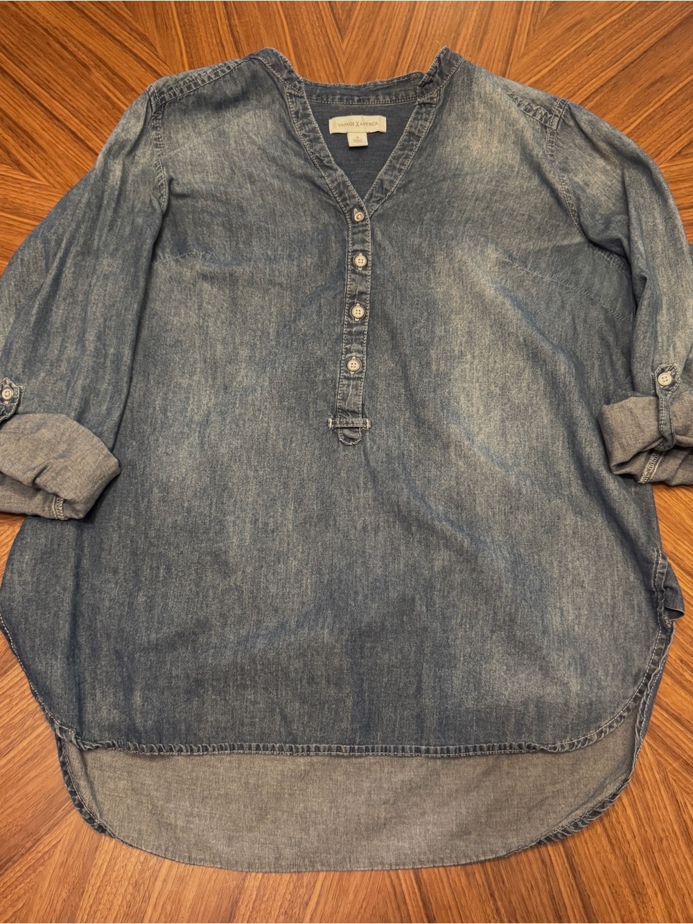 Women’s soft chambray Henley style tunic. Long sleeve or button to 3/4 length.